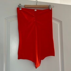 Brand New without tags! American ApparelOrange strapless bodysuit. Size M.